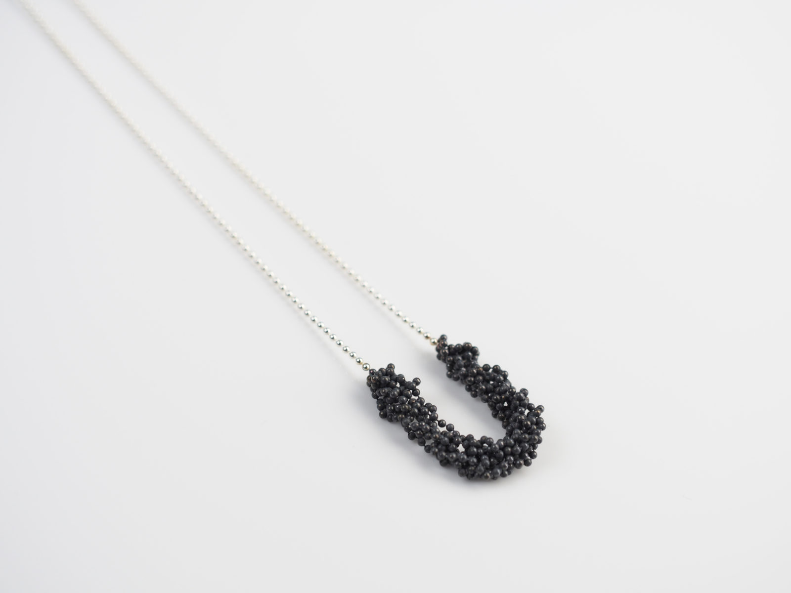 K1 P1 Pendant — dark with bright chain