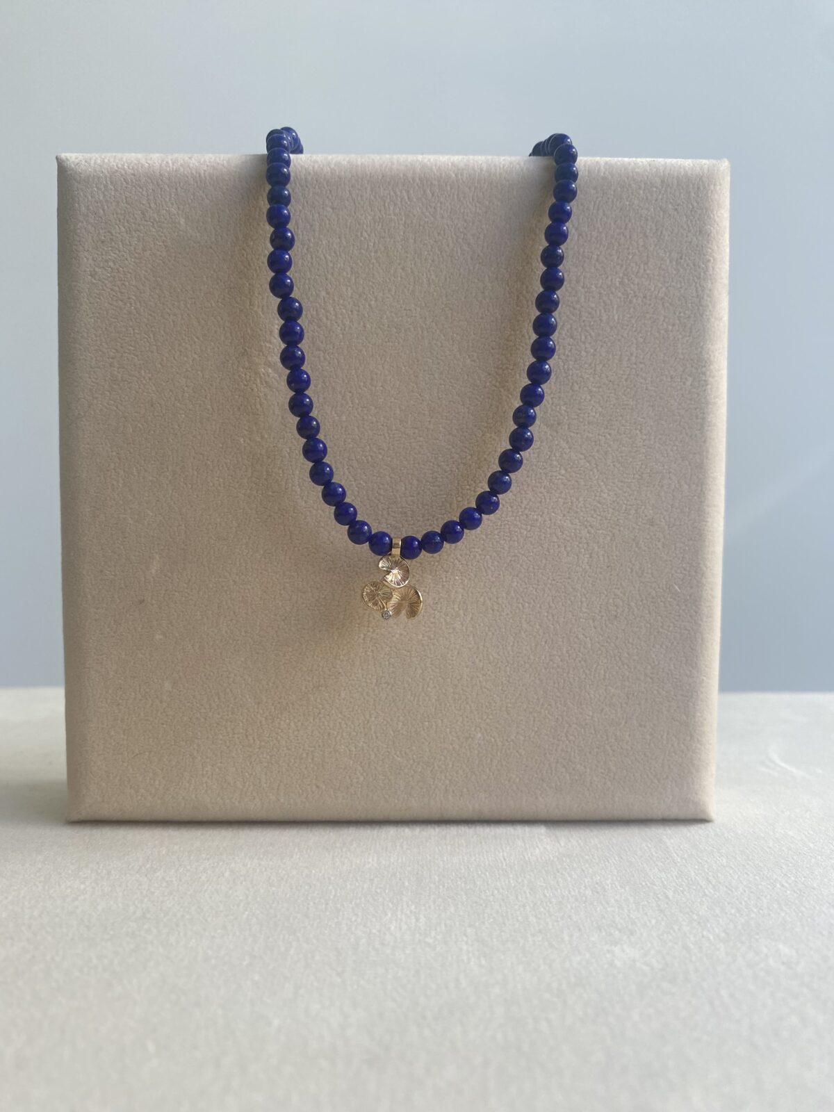 Lapis Lazuli beads with Song of the Naiad diamond Pendant