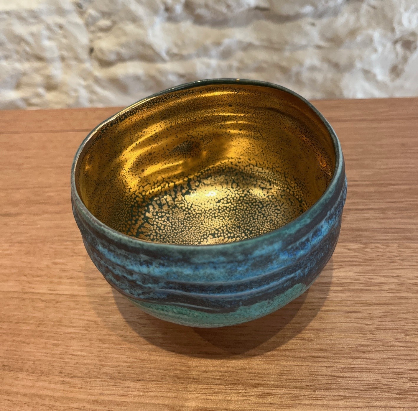 Mona tea bowl with mottled gold interior