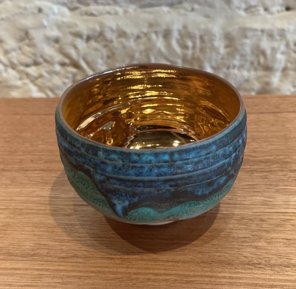 gold tea bowl