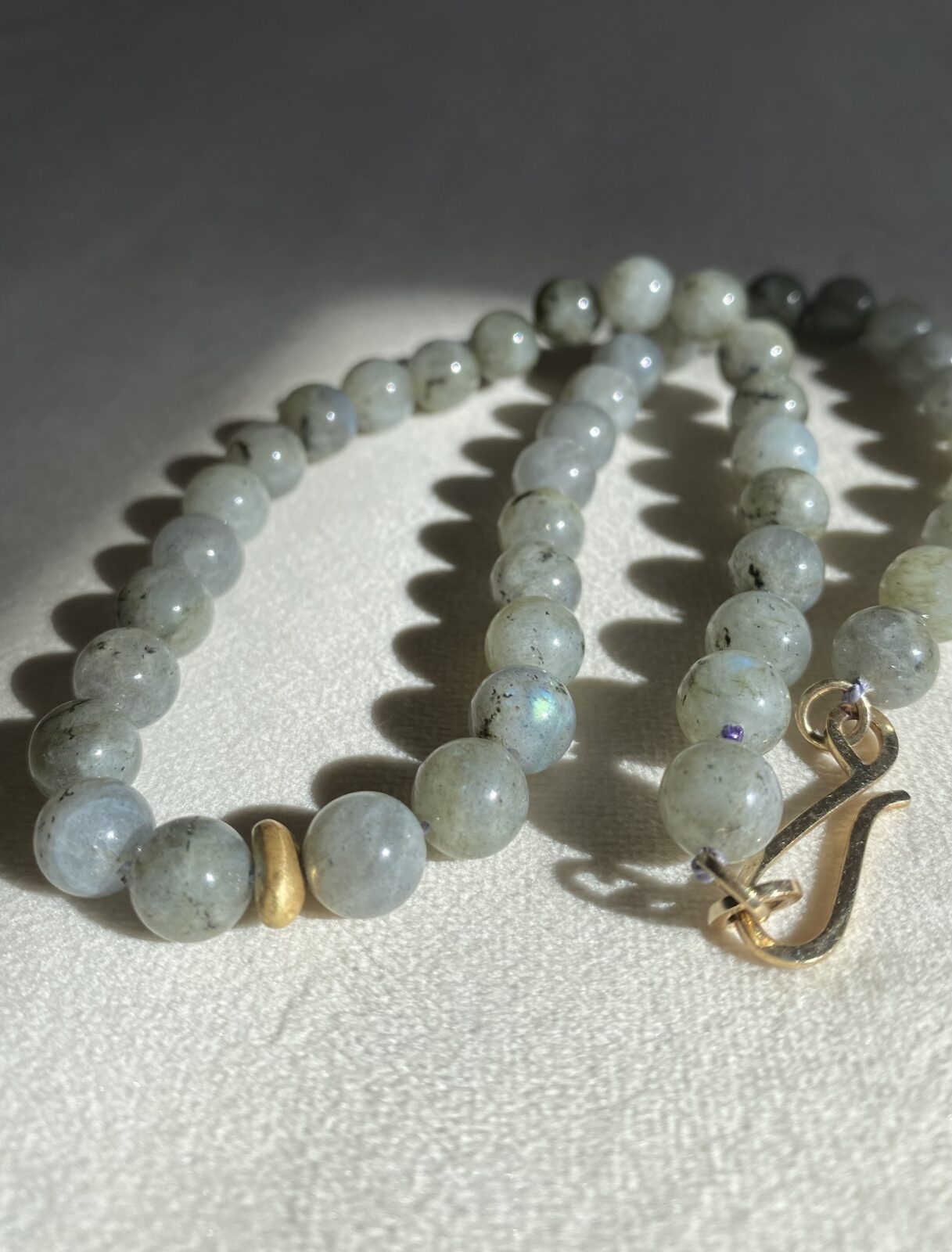 Beads - Labradorite and gold nugget bead.