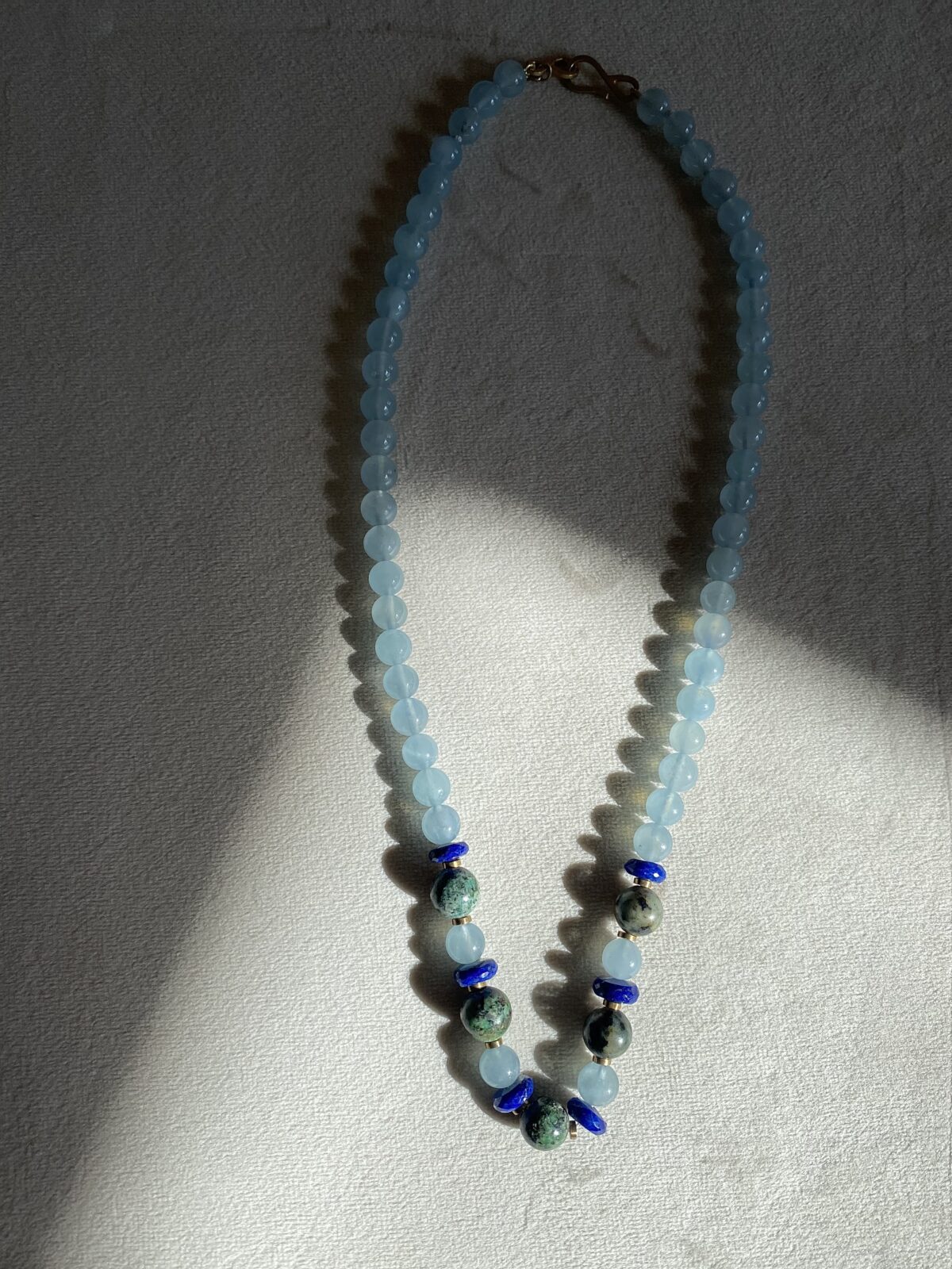Beads - Aquamarine, lapis, african turquoise and 18ct gold.