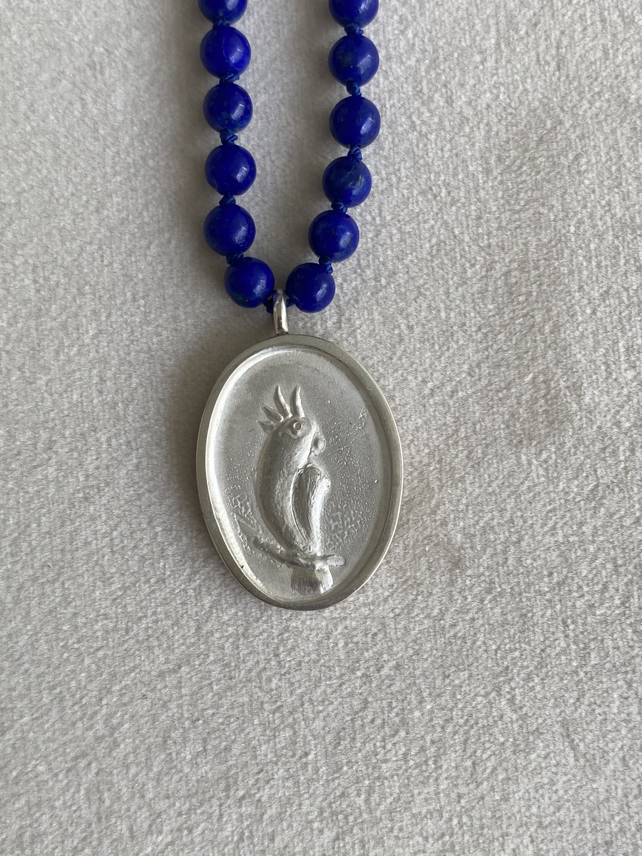 Aria Cockatoo pendant on Lapis beads