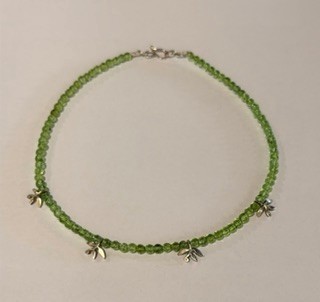 Peridot beads with silver motif